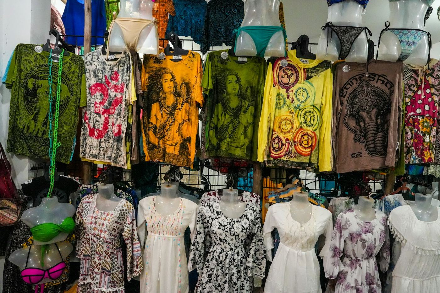 Clothing displayed on racks in the boutique