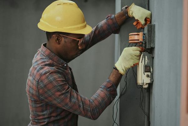 Electrical crew working on a meter box